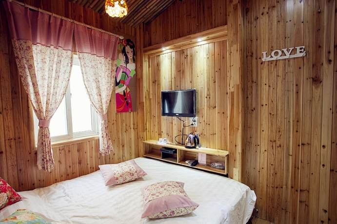 Imagen de la habitación del Hotel Wuzhen Youyou Inn. Foto 18