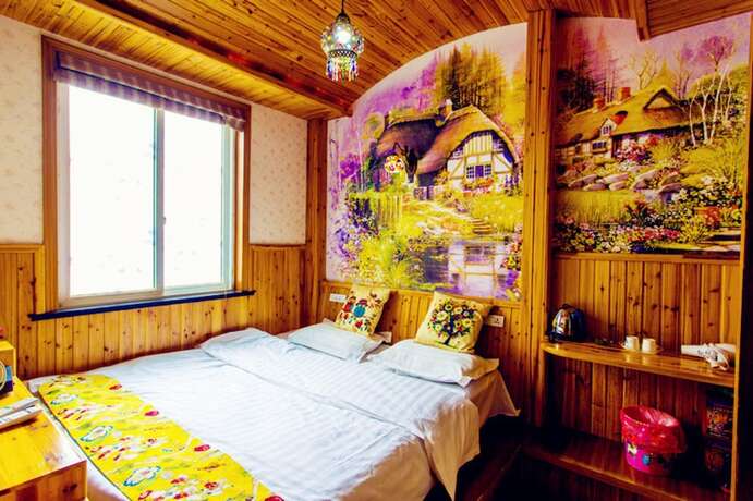 Imagen de la habitación del Hotel Wuzhen Youyou Inn. Foto 19