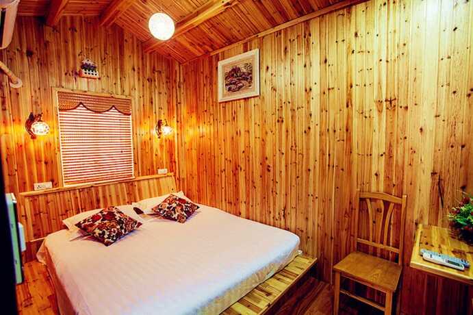 Imagen de la habitación del Hotel Wuzhen Youyou Inn. Foto 20