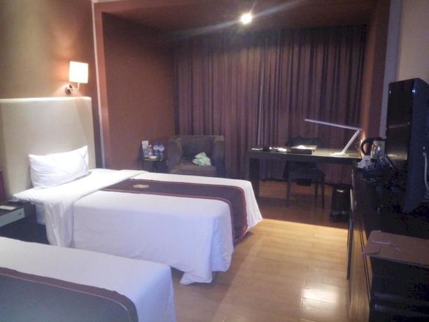 Imagen de la habitación del Hotel Wuzhishan International Haikou. Foto 8