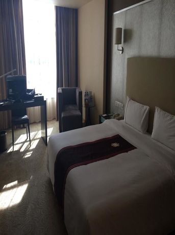 Imagen de la habitación del Hotel Wuzhishan International Haikou. Foto 12