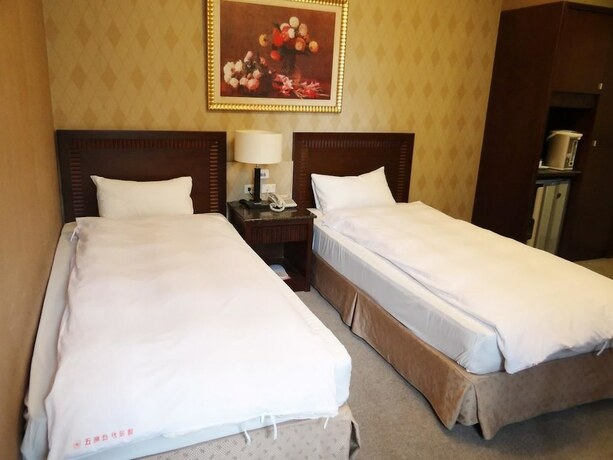 Imagen general del Hotel Wuzhou. Foto 9