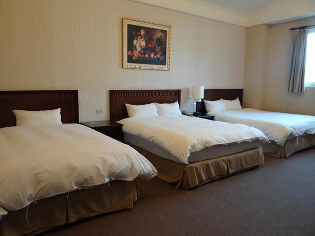 Imagen de la habitación del Hotel Wuzhou. Foto 12