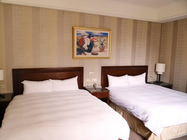 Imagen de la habitación del Hotel Wuzhou. Foto 15