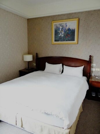 Imagen de la habitación del Hotel Wuzhou. Foto 16