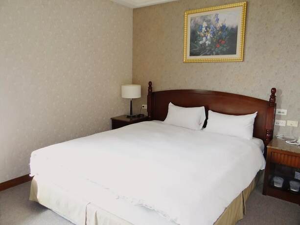 Imagen de la habitación del Hotel Wuzhou. Foto 22