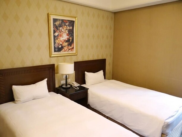 Imagen de la habitación del Hotel Wuzhou. Foto 29