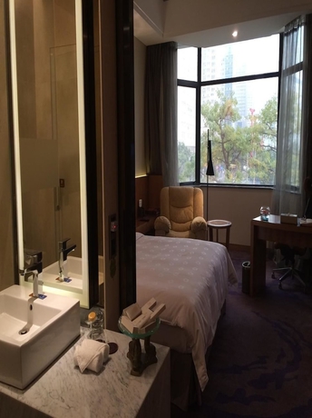 Imagen de la habitación del Hotel Wuzhou Guest House - Shenzhen. Foto 3