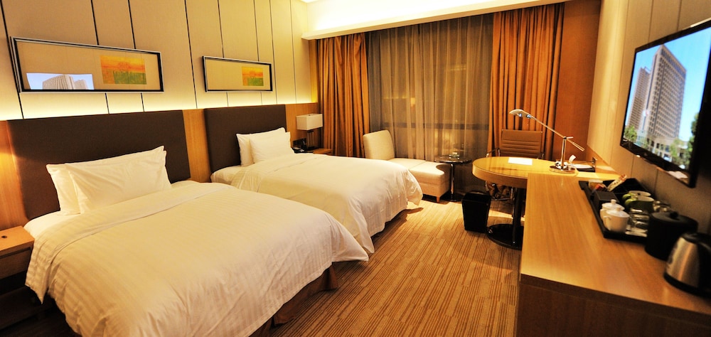 Imagen de la habitación del Hotel Wyndam Xuzhou East. Foto 10