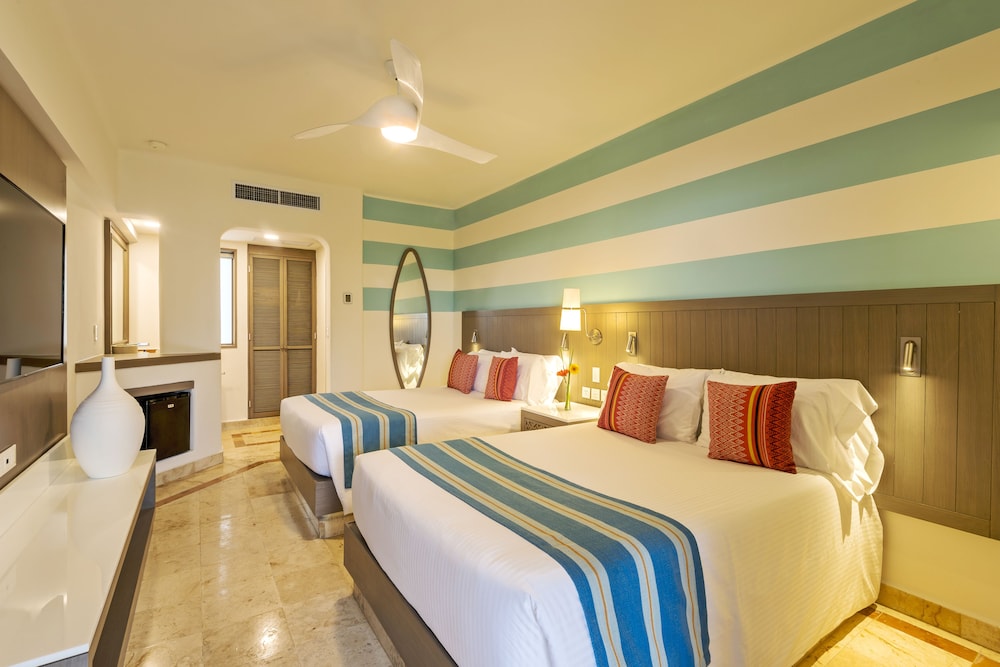 Imagen de la habitación del Hotel Wyndham Alltra Playa Del Carmen Adults Only All Inclusive. Foto 11