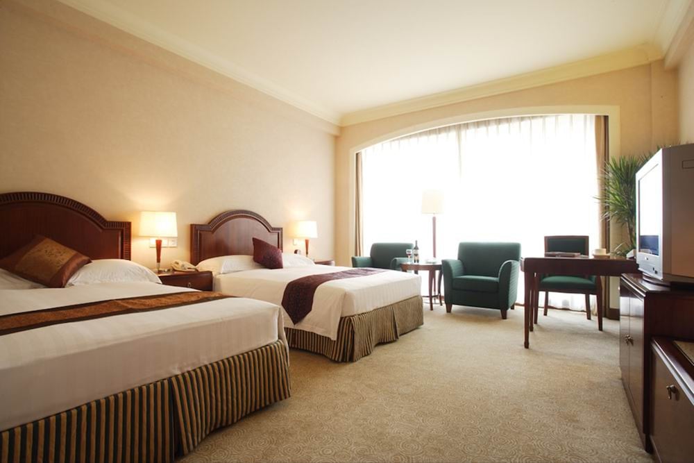 Imagen de la habitación del Hotel Wyndham Beijing North. Foto 6