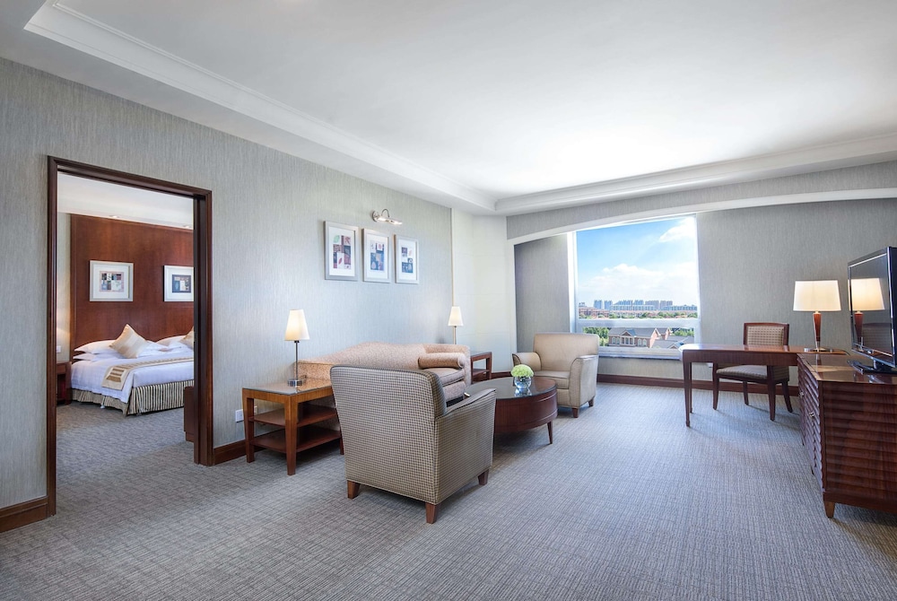 Imagen de la habitación del Hotel Wyndham Beijing North. Foto 8