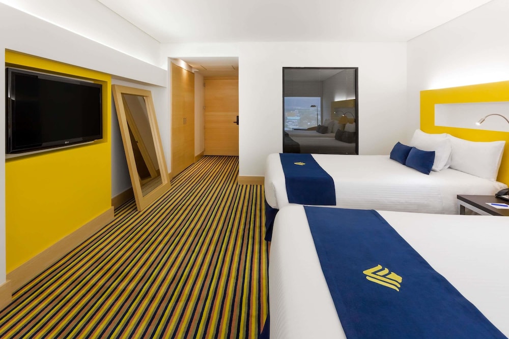 Imagen de la habitación del Hotel Wyndham Bogotá. Foto 13