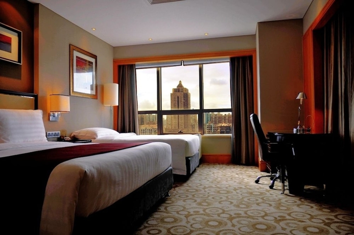 Imagen de la habitación del Hotel Wyndham Bund East Shanghai. Foto 3