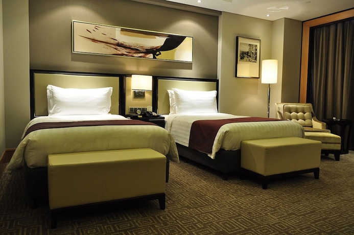 Imagen de la habitación del Hotel Wyndham Bund East Shanghai. Foto 10