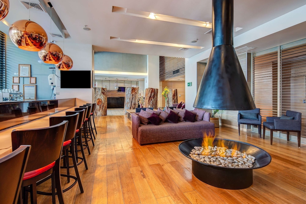 Imagen del bar/restaurante del Hotel Wyndham Concepcion Pettra. Foto 2