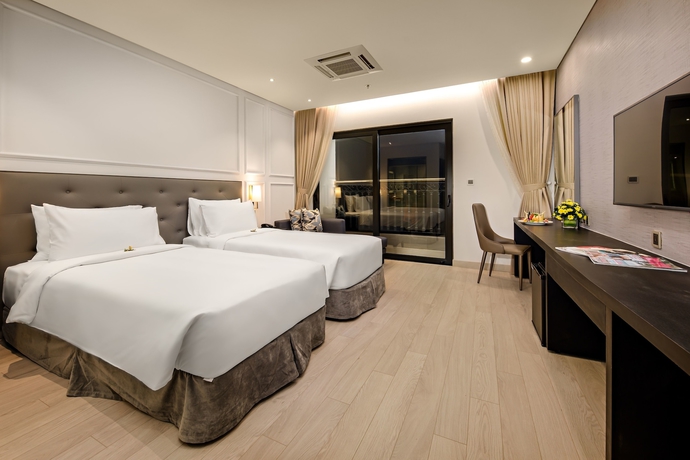 Imagen de la habitación del Hotel Wyndham Danang Golden Bay. Foto 10