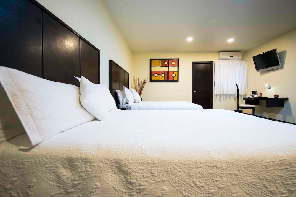 Imagen de la habitación del Hotel Wyndham Garden Aguascalientes Hotel & Casino. Foto 5