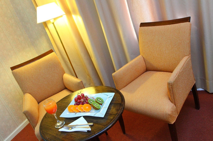 Imagen de la habitación del Hotel Wyndham Garden Campana. Foto 7