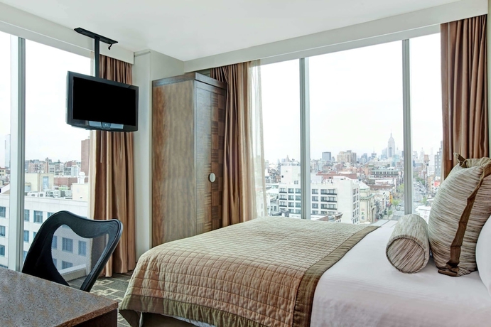 Imagen de la habitación del Hotel Wyndham Garden Chinatown. Foto 2