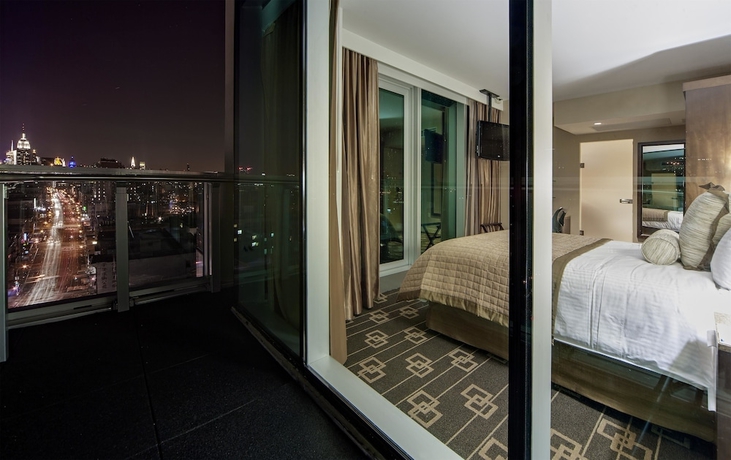 Imagen de la habitación del Hotel Wyndham Garden Chinatown. Foto 3