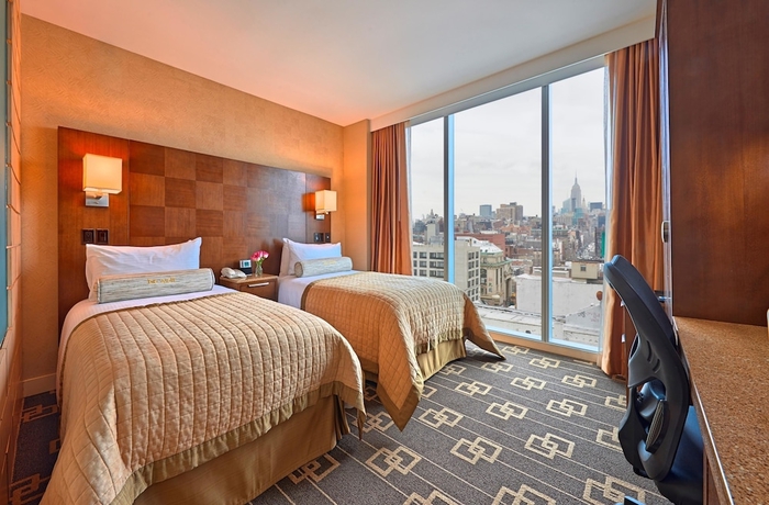 Imagen de la habitación del Hotel Wyndham Garden Chinatown. Foto 9