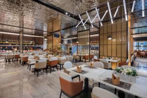 Imagen del bar/restaurante del Hotel Wyndham Garden Gaozhou. Foto 8
