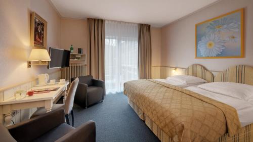Imagen de la habitación del Hotel Wyndham Garden Gummersbach. Foto 12
