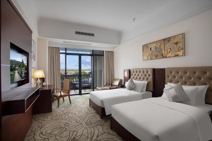 Imagen de la habitación del Hotel Wyndham Garden Haikou South. Foto 12