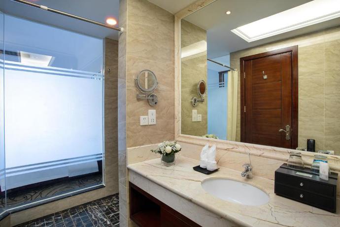 Imagen de la habitación del Hotel Wyndham Garden Haikou South. Foto 13