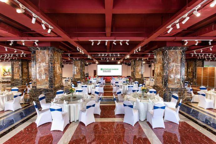 Imagen del bar/restaurante del Hotel Wyndham Garden Haikou South. Foto 8