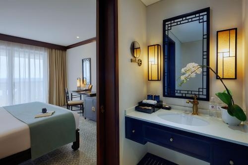 Imagen de la habitación del Hotel Wyndham Garden Hoi An Cua Dai Beach. Foto 8