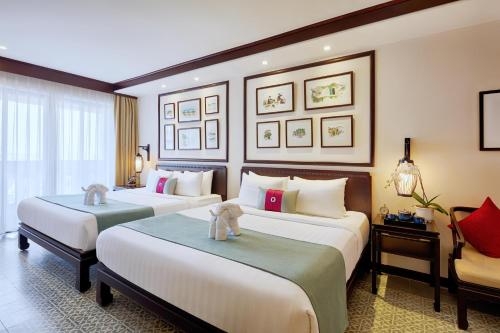 Imagen de la habitación del Hotel Wyndham Garden Hoi An Cua Dai Beach. Foto 9