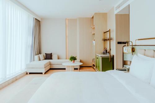 Imagen de la habitación del Hotel Wyndham Garden Huai\'an New City. Foto 14