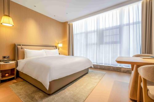 Imagen de la habitación del Hotel Wyndham Garden Huai\'an New City. Foto 18