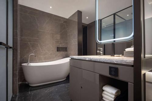 Imagen de la habitación del Hotel Wyndham Garden Lanzhou West Railway Station. Foto 11