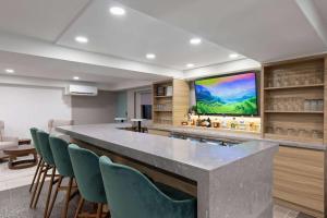 Imagen del bar/restaurante del Hotel Wyndham Garden Louisville KY. Foto 8