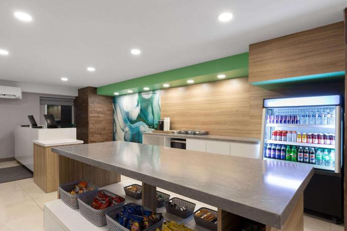 Imagen del bar/restaurante del Hotel Wyndham Garden Louisville KY. Foto 9