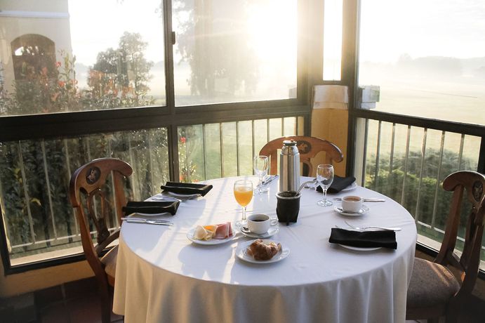 Imagen del bar/restaurante del Hotel Wyndham Garden Luj&aacute;n. Foto 3