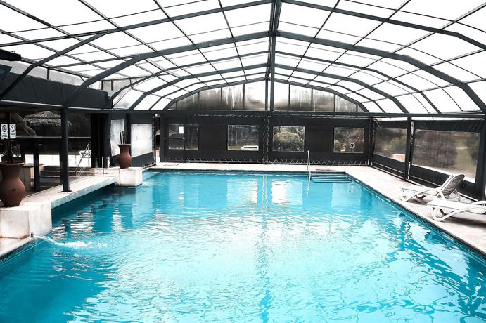 Imagen de la piscina del Hotel Wyndham Garden Luj&aacute;n. Foto 19