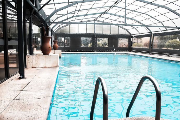 Imagen de la piscina del Hotel Wyndham Garden Luj&aacute;n. Foto 20