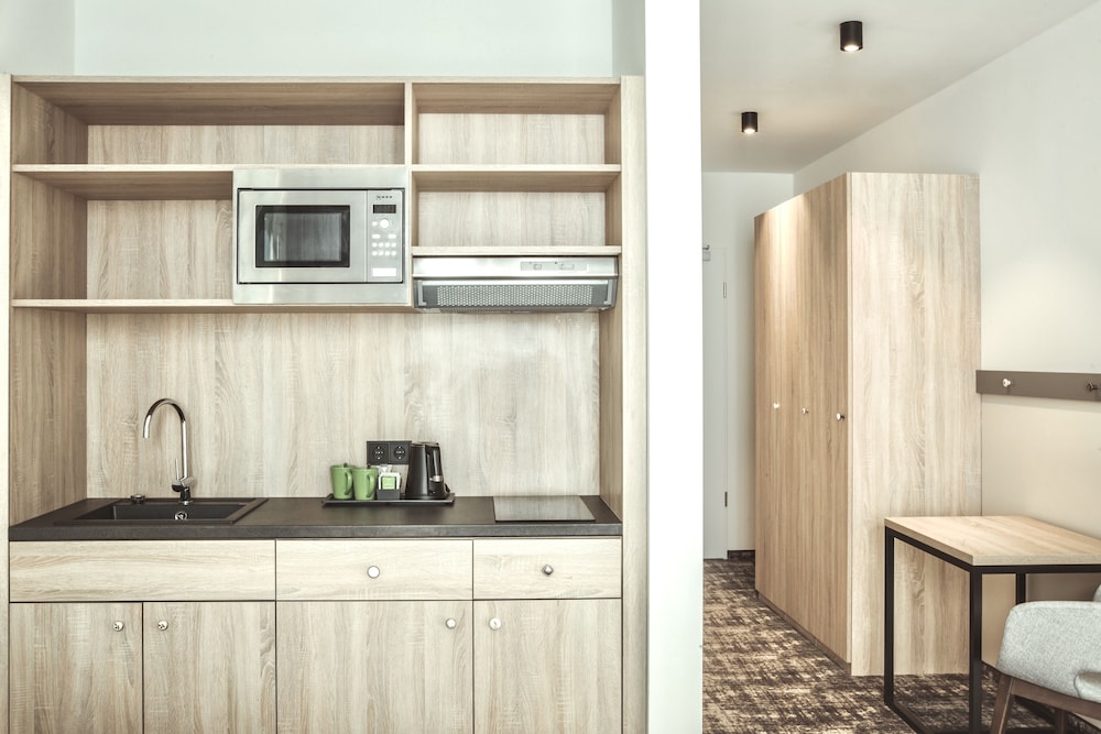 Imagen de la habitación del Hotel Wyndham Garden Munich Messe. Foto 10