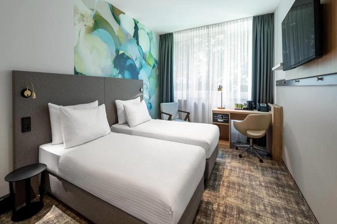 Imagen de la habitación del Hotel Wyndham Garden Munich Messe. Foto 6