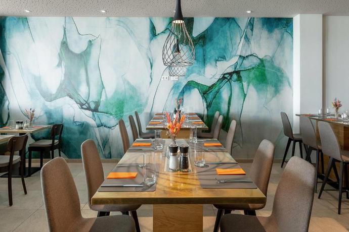 Imagen de los interiores del Hotel Wyndham Garden Munich Messe. Foto 13