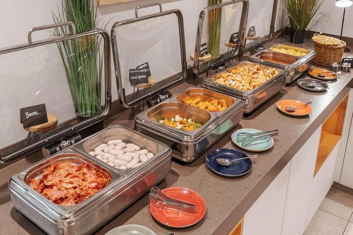 Imagen de los interiores del Hotel Wyndham Garden Munich Messe. Foto 16