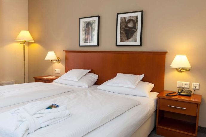 Imagen de la habitación del Hotel Wyndham Garden Quedlinburg Stadtschloss. Foto 4