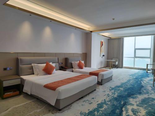 Imagen de la habitación del Hotel Wyndham Garden Rizhao Donggang Resort. Foto 8
