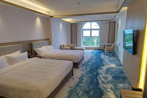 Imagen de la habitación del Hotel Wyndham Garden Rizhao Donggang Resort. Foto 9
