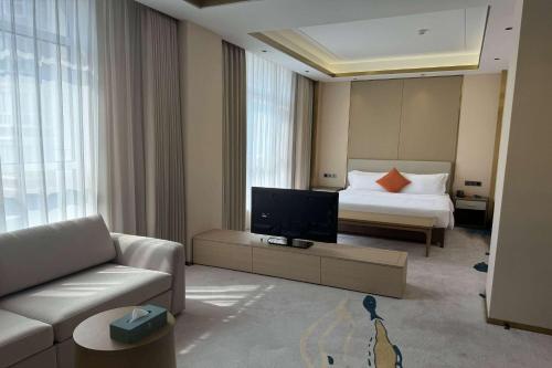 Imagen de la habitación del Hotel Wyndham Garden Rizhao Donggang Resort. Foto 10