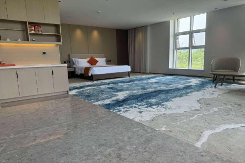 Imagen de la habitación del Hotel Wyndham Garden Rizhao Donggang Resort. Foto 11